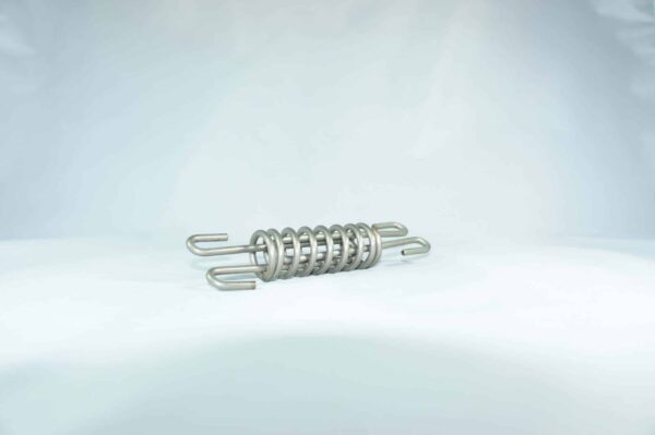 Limited length tension spring