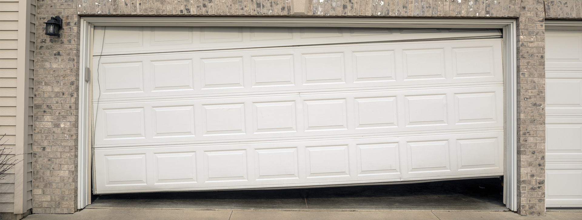 Why do garage door springs break?
