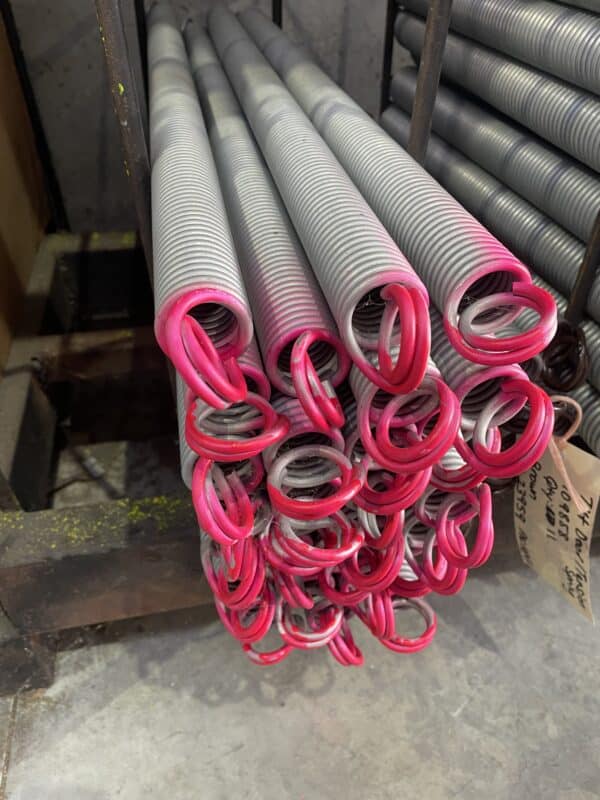 Tilt garage door springs